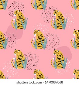 Seamless pattern with cute tigers and tropical flowers on pink background. Hand drawn wallpaper with animal
