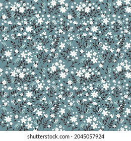 seamless pattern with cute tiny flowers. retro design. flat hand drawn illustration, nature inspired vintage background.