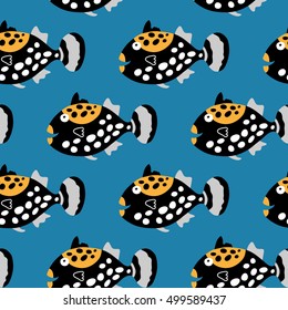 Seamless pattern with a cute tropical fish clowns