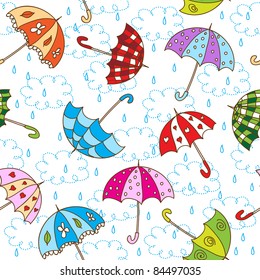 Seamless pattern with cute umbrellas