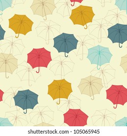 Seamless pattern with cute umbrellas. Vector illustration.