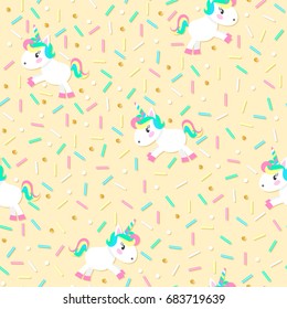 Seamless pattern with cute unicorn and sweet color sugar sprinkle on a yellow background. Vector illustration.