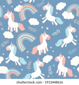 Seamless pattern with cute unicorns, clouds and rainbow