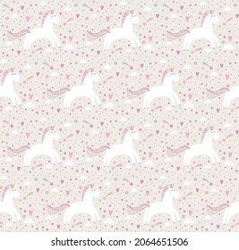 
Seamless pattern of the cute unicorns, hearts, stars, clouds