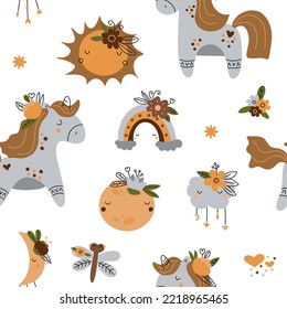 Seamless pattern with cute unicorns, sun, rainbow and moon in boho style. Vector illustration on a white background for nursery decoration and textiles.