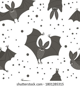 Seamless pattern with cute vector bats. Digital paper with Halloween characters. Funny autumn all saints eve background with flying and sleeping black animals for kids