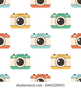 Seamless pattern with cute vintage photo cameras. Vector illustration in flat style