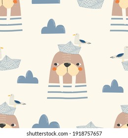 Seamless pattern of cute walrus and sea gull on a paper boat on a yellow background. Vector illustration for printing on fabric, packaging paper, postcards, posters, banners. Cute baby background