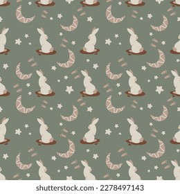 Seamless pattern with cute white rabbits on a green background. Perfect for textiles, wallpapers or prints.