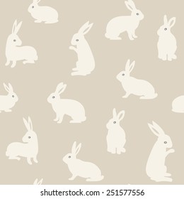 Seamless pattern with cute white rabbits. Vector illustration. 