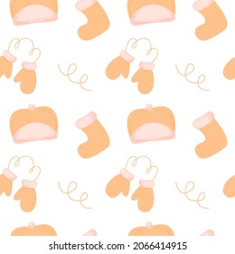 Seamless pattern with cute winter headwear, socks, mittens. Concept of clothes, cold.