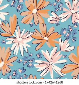 Seamless pattern with daisies. Mixed small and large blooming flower heads ornament. Bright summer botanical background in modern flat design.