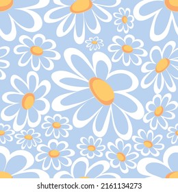 Seamless pattern with daisies on blue background. Suitable for textile, fabric, wallpaper, wrapping. Hand drawn vector illustration