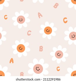 Seamless pattern with daisy flower cartoons and hand written alphabet on cream background. Nursery wallpaper or textile  vector.