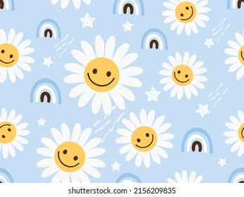 Seamless pattern with daisy flower cartoons, rainbows and stars on blue sky background vector illustration.