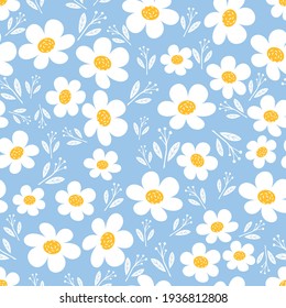 Seamless pattern with daisy flower and leaves on blue background vector illustration. cute floral print.