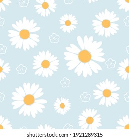 Seamless pattern with daisy flower  on blue background vector illustration. Cute floral print.