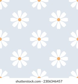 Seamless pattern with a daisy flower on a blue background. Vector illustration.