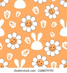 Seamless pattern with daisy flower, rabbit cartoons and paw prints on orange background vector illustration.