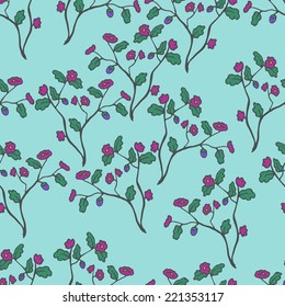 Seamless pattern with dark bushes of ripe blackberries on a blue background