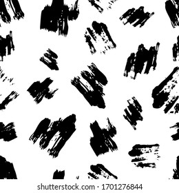 Seamless pattern with dark hand drawn scribble smear on white background. Abstract grunge texture. Vector illustration
