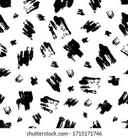 Seamless pattern with dark hand drawn scribble smear on white background. Abstract grunge texture. Vector illustration
