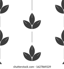Seamless pattern with dark leaves