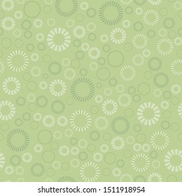 Seamless pattern of dashed circles on shades of green.