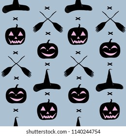 A seamless pattern for the day of Halloween, with pumpkins, a broom and a witch hat