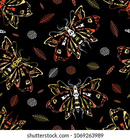 Seamless pattern. Dead head butterflies among flowers and leaves. Great for print on a T-shirt. Ideal for decoration of Halloween and the Day of the Dead.