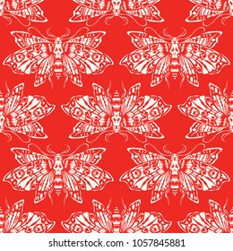 Seamless pattern. Dead head butterfly. Isolated on a red background. Great for tattoo or print on a T-shirt. Ideal for decoration of Halloween and the Day of the Dead.