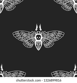 Seamless pattern. Dead head butterfly. Moth isolated on a black background. Great for tattoo, print on a T-shirt, for decoration of Halloween and the Day of the Dead and more.