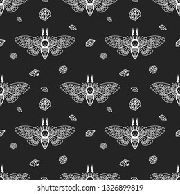 Seamless pattern. Dead head butterfly. Moth isolated on a black background. Great for tattoo, print on a T-shirt, for decoration of Halloween and more.