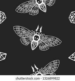 Seamless pattern. Dead head butterfly. Moth on a black background. Great for tattoo, print on a T-shirt, for Halloween and more.