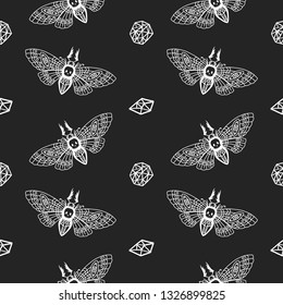 Seamless pattern. Dead head butterfly. Moth on a black background. Great for tattoo, print on a T-shirt, for decoration of Halloween and more.