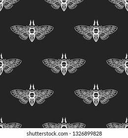 Seamless pattern. Dead head butterfly. Moth on a black background. Great for tattoo, print on a T-shirt, for decoration of Halloween and the Day of the Dead and more.