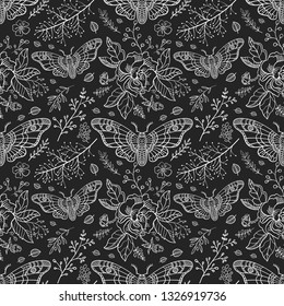 Seamless pattern. Dead head butterfly. Night garden. Moth among flowers isolated on a black background. Great for tattoo, print on a T-shirt, for decoration of Halloween and more.