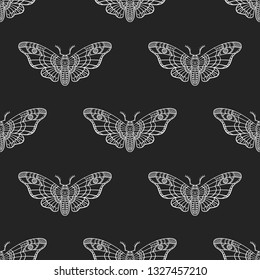 Seamless pattern. Dead head butterfly. Night insects. Moth isolated on a black background. Great for tattoo, print on a T-shirt, for decoration of Halloween and more.