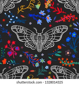 Seamless pattern. Dead head butterfly in night garden. Beautiful wildflowers. Moth among flowers isolated on a black background. Hand drawn illustration for Halloween and more.
