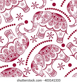 Seamless pattern with decorated elephants. Ethnic elephant. Texture with stylized patterned elephants in Indian style. Vector endless background