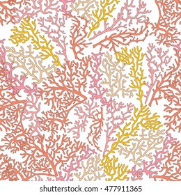 Seamless pattern with decorative corals and sea or aquarium fish. Colored Vector illustration