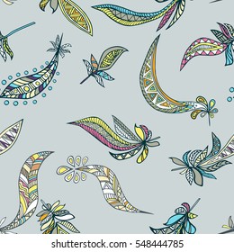 Seamless pattern with decorative feathers. Vector