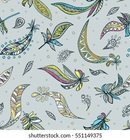 Seamless pattern with decorative feathers. Vector