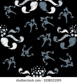 Seamless pattern of decorative flowers. Imitation embroidery.