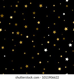 seamless pattern of decorative golden stars on a black background