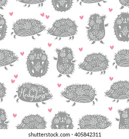 Seamless pattern with decorative hedgehogs. Cute kids background. Vector illustration.