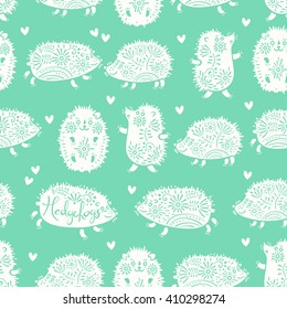 Seamless pattern with decorative hedgehogs. Cute kids background. Vector illustration.