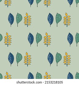 Patrón sin soldadura con hojas decorativas sobre un fondo verde