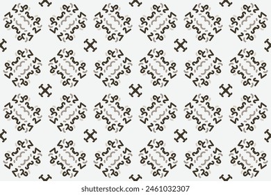 un patrón sin fisuras con un adorno decorativo en marrón y beige.
