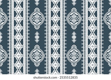 Seamless pattern with decorative ornament. Ikat ethnic flower oriental traditional. Motifs African boho. Aztec embroidery border.Indian, Gypsy, and African rug. Bohemian. Vintage background 